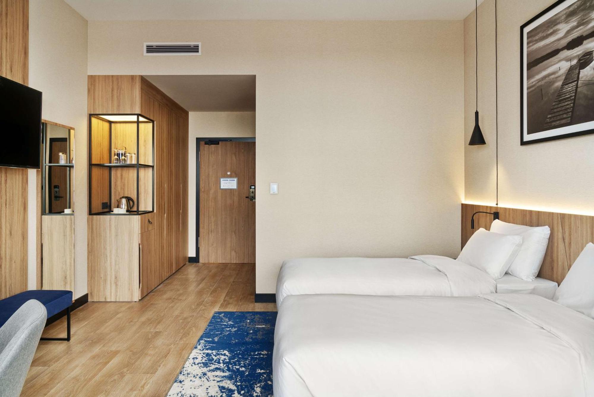 Radisson Blu Resort & Conference Center, Ostroda Mazury Kültér fotó A room at the hotel